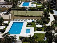 Aerial View of Pool and Tennis Court - Paradise Centre Apartments